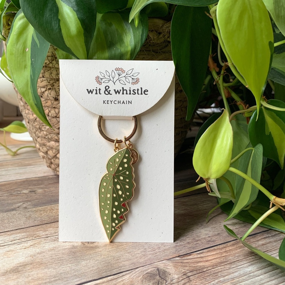 Wit & Whistle enamel keychain